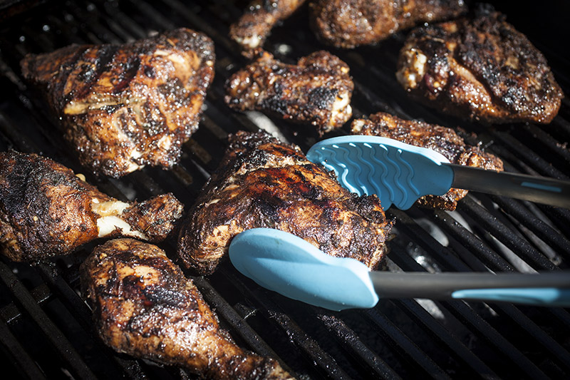 Classic Jamaican Jerk Chicken, marinated over-night and then grilled. Notice the signature black crust from the large amount of black pepper, allspice and dark soya. Our BBQXL 3 Piece Tool Set is an inexpensive must have for any barbie enthusiast. Click on the picture for more details!
