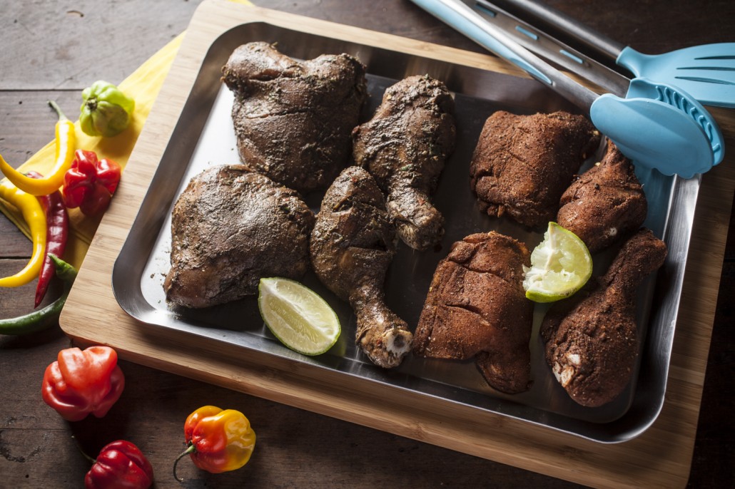 On the left, traditional style Jamaican Jerk Chicken marinated for 24 hours. On the right, Jamaican Jerk spices used as a rub. The BBQXL Stainless Steel Tray is ideal for bringing rubbed or marinated raw meat to the grill and the Bamboo Chopping Board is great for bringing cooked foods to the table. Click on the image to view it on our site.