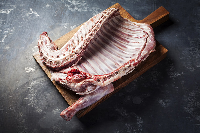 Imaged here is a square-cut shoulder of lamb with  the entire rib rack. A square cut shoulder normally only has about 4 ribs attached and it's up to you how you'd like to buy it from your butcher.