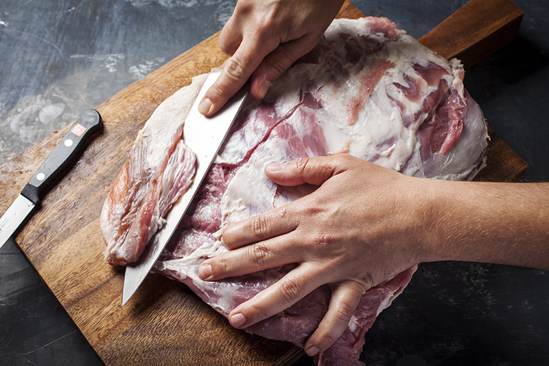 Remove the meat from the top portion of the rack (the part that does not have the eye muscle in it).