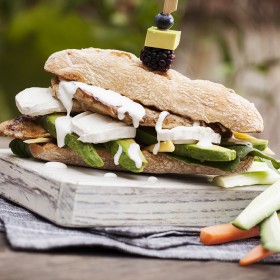 Cumin and lemon marinated grilled chicken sandwich with goat cheese, avocado and crème fraîche. Refreshingly delicious!