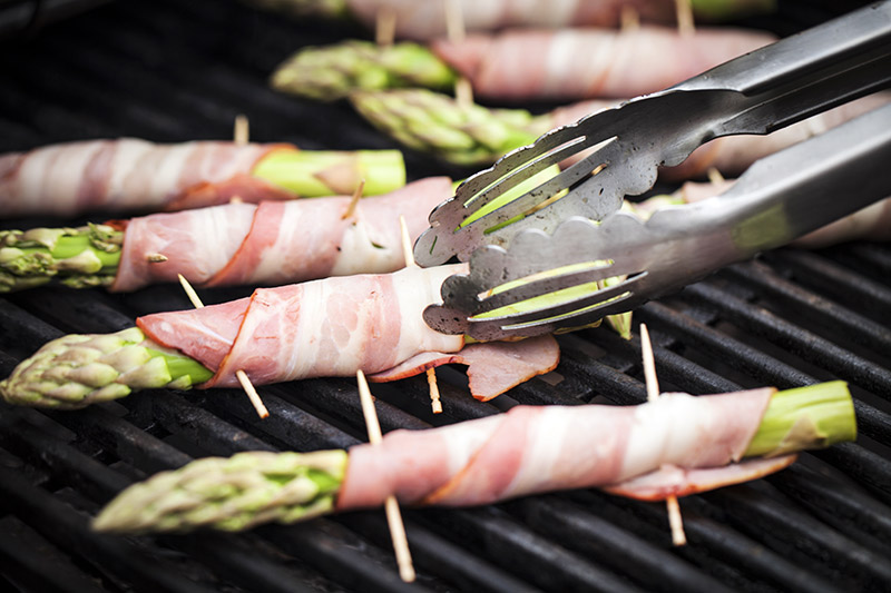 Grill the vegetable/bacon wraps over medium heat once the lobster has been flip to flesh-side down.