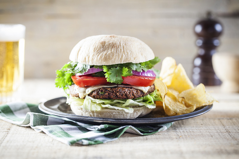 And here we have it! The black bean and cumin burger, topped with whatever you like but don't hold back on the coriander! Click on the image for the recipe! 
