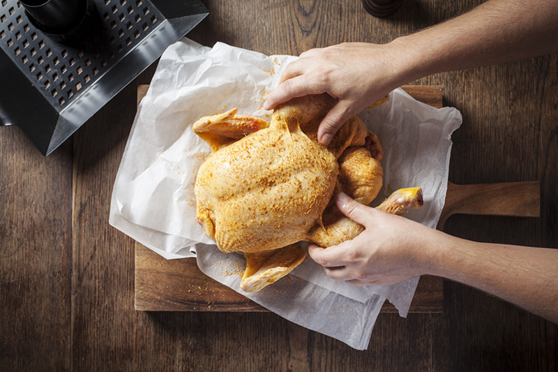 Now, having "sprinkled" the seasoning all over the chicken, it's time to rub it in! This is of course where the term "rub" came from. Check out our post on sauces vs. rubs if you haven't seen it!